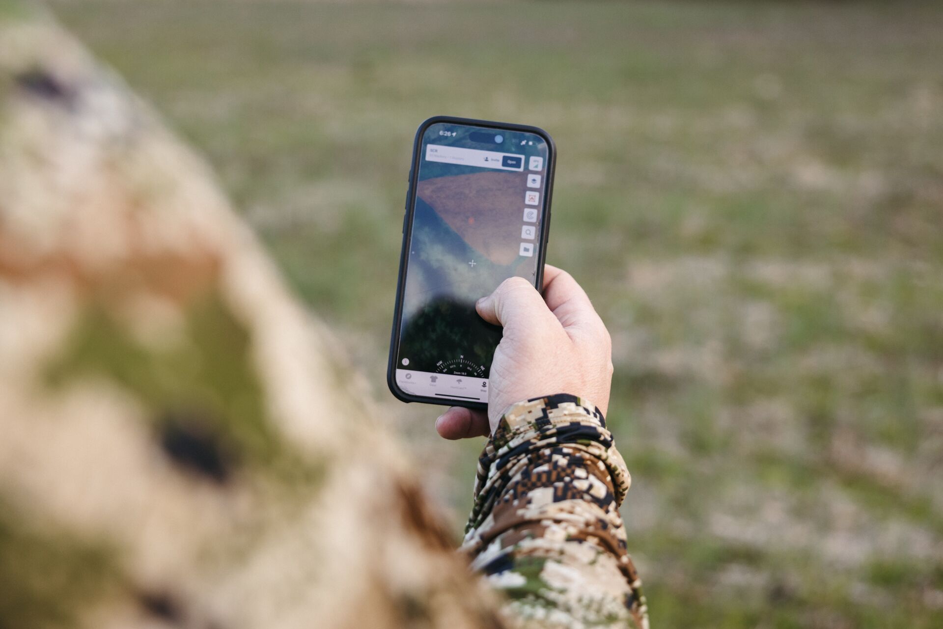 Hunter using HuntWise mapping feature on phone.
