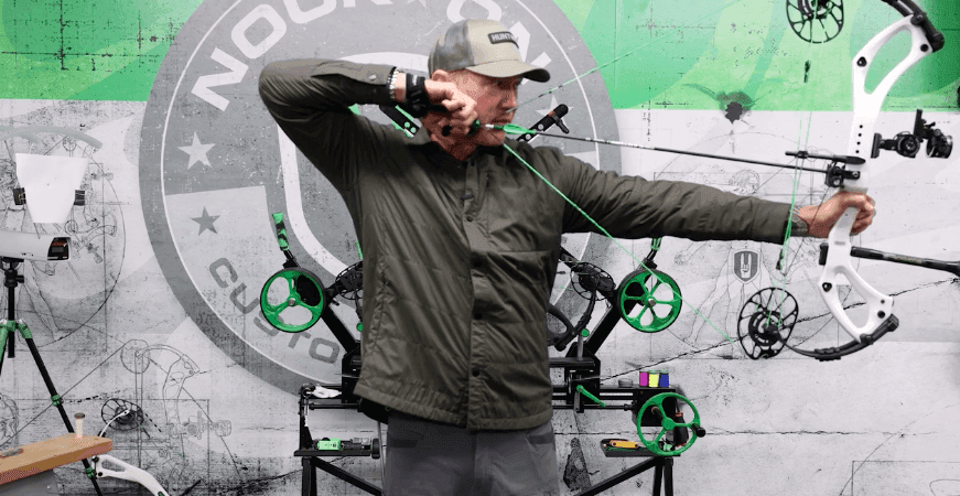 John Dudley in a full draw with a compound bow.