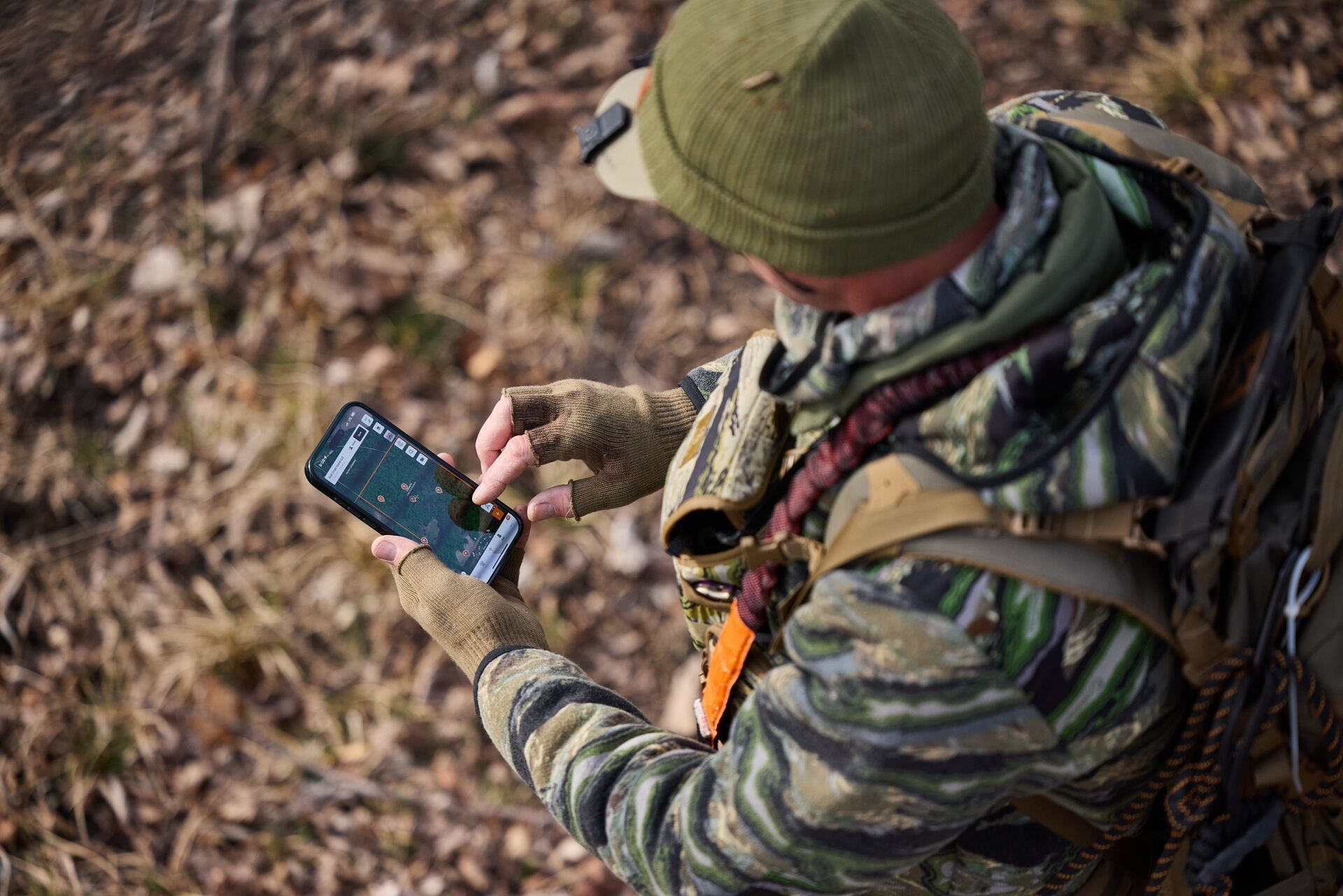 Hunter using HuntWise to scout for deer hunting land/.