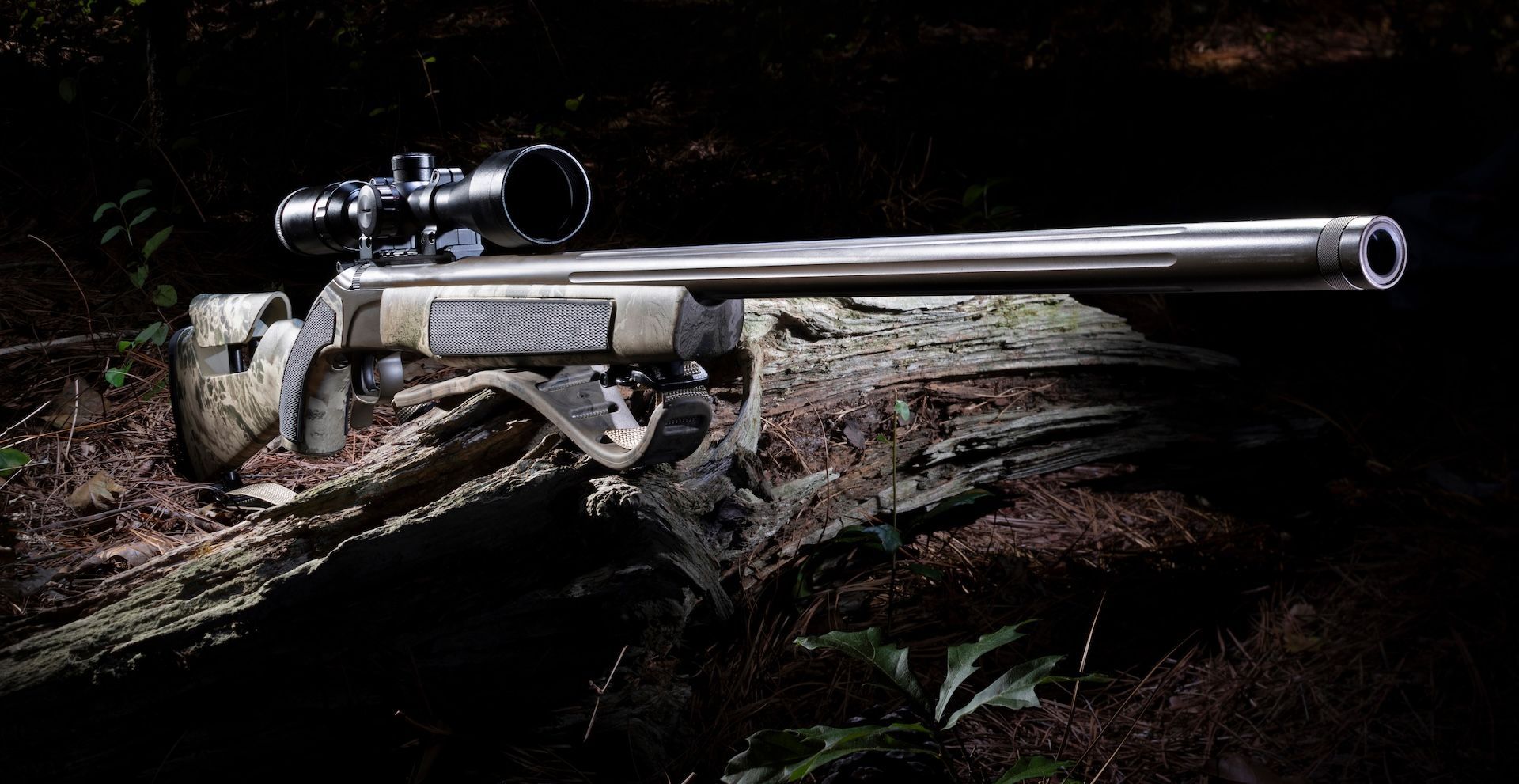 Muzzleloader rifle with scope, what is a muzzleloader concept.