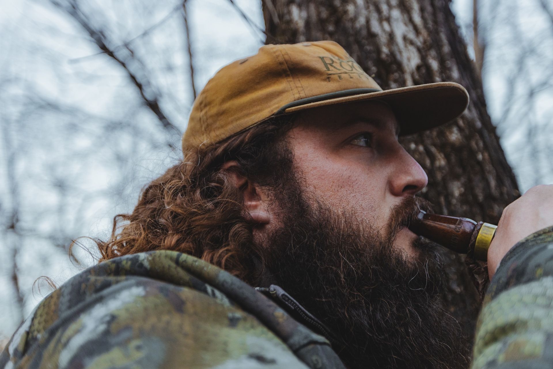 Ben Cole uses a duck call, best waterfowl hunting tips concept.