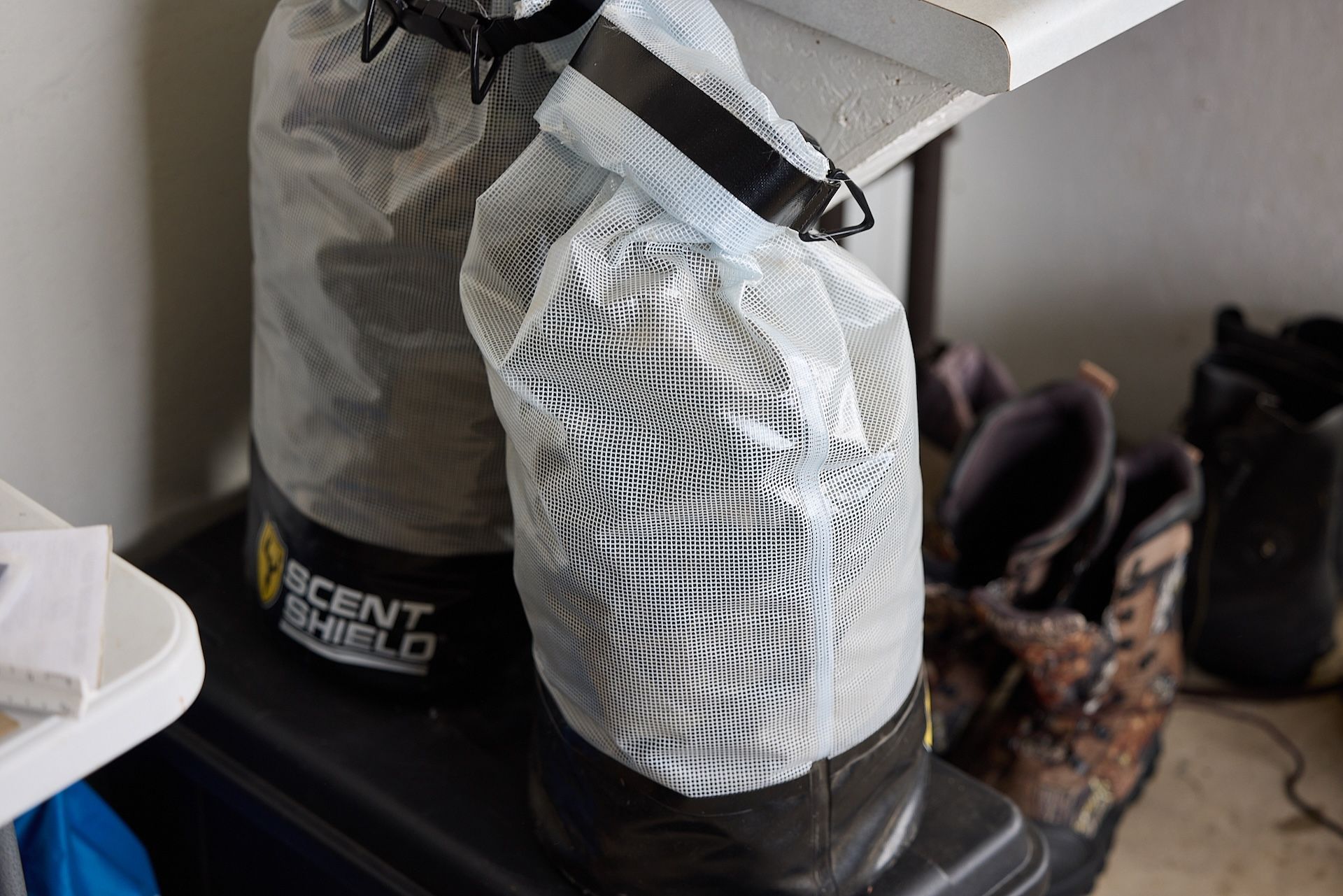 Hunting gear in scent shield bags, hunting gear storage ideas concept.
