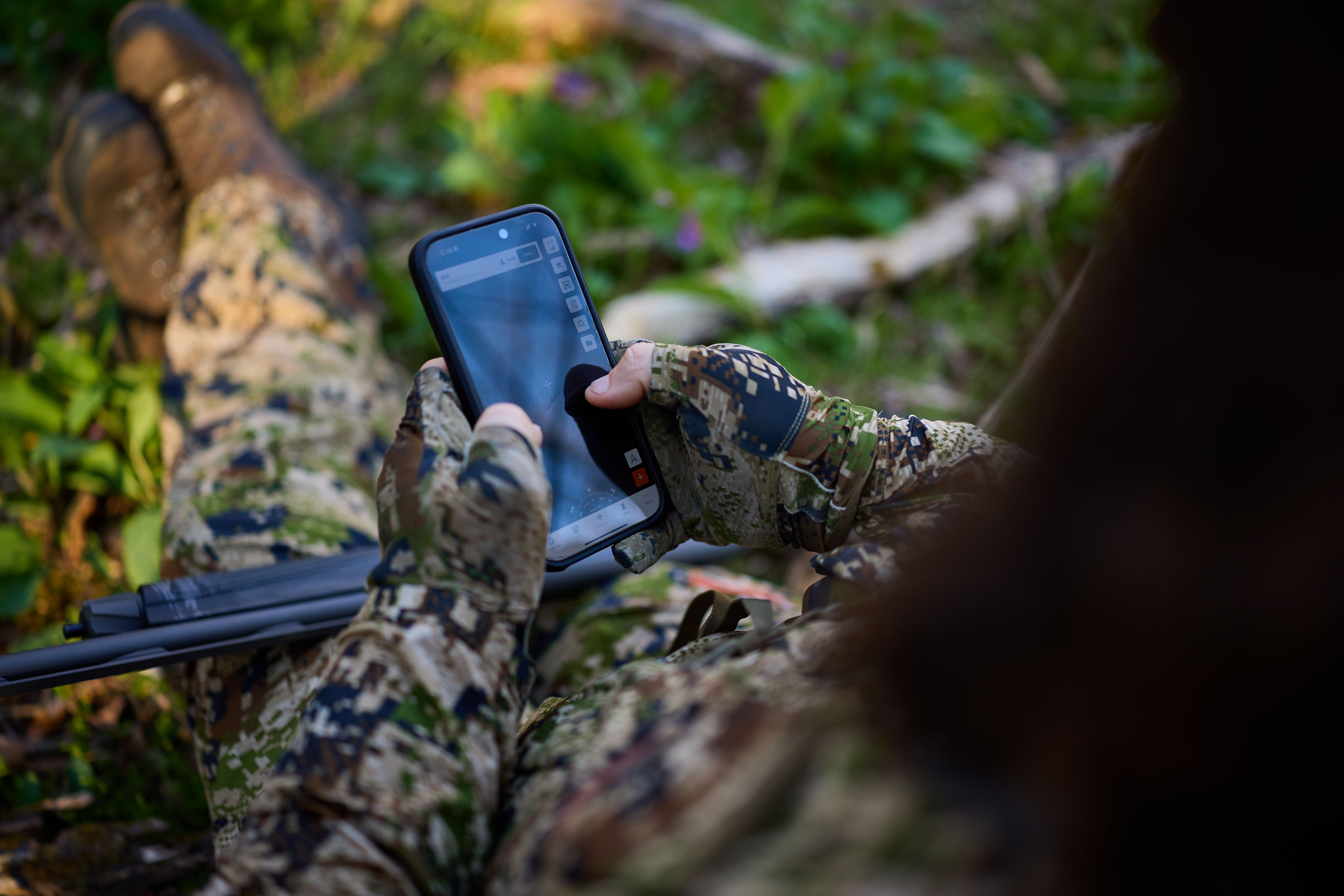 Man with Hunting App InField