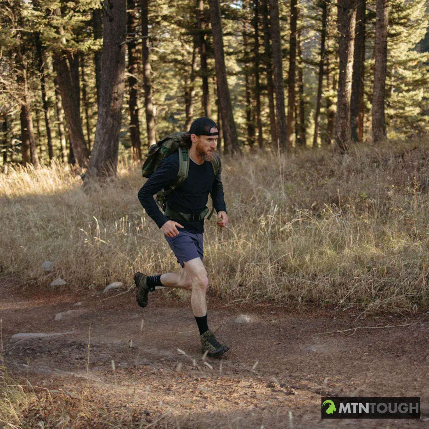 A guy runs a trail with a weighted pack, when should a hunter get in shape for a hunt concept.