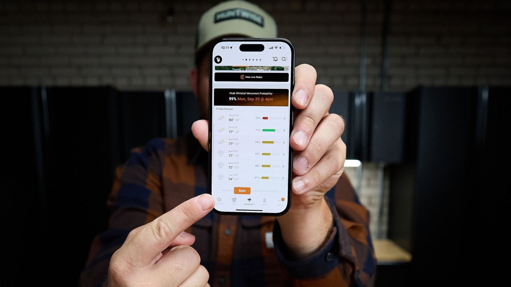 Hunter shows phone with HuntWise HuntCast on screen, HuntWise vs HuntStand concept.