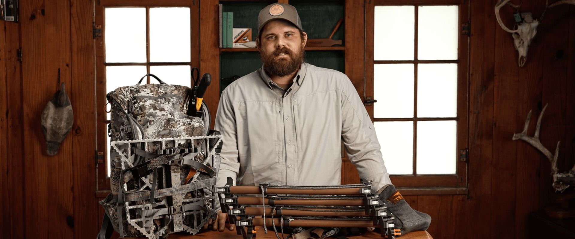 A HuntWise team member shows off mid-season hunting gear.
