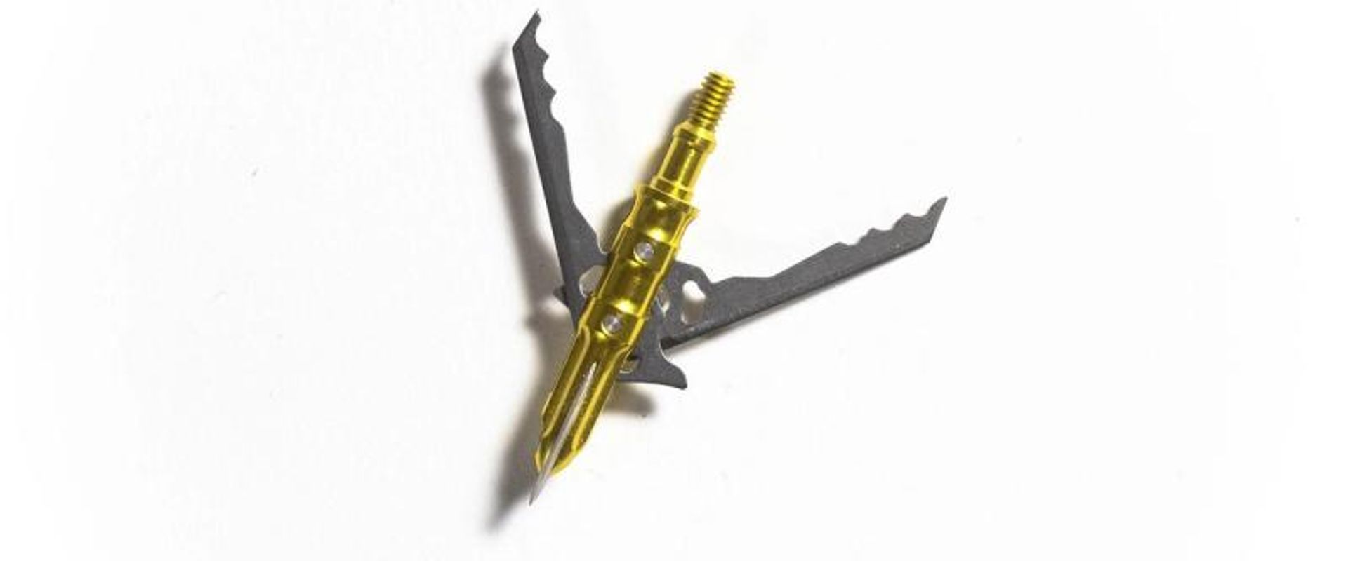 Isolated image of a yellow broadhead on a white background.