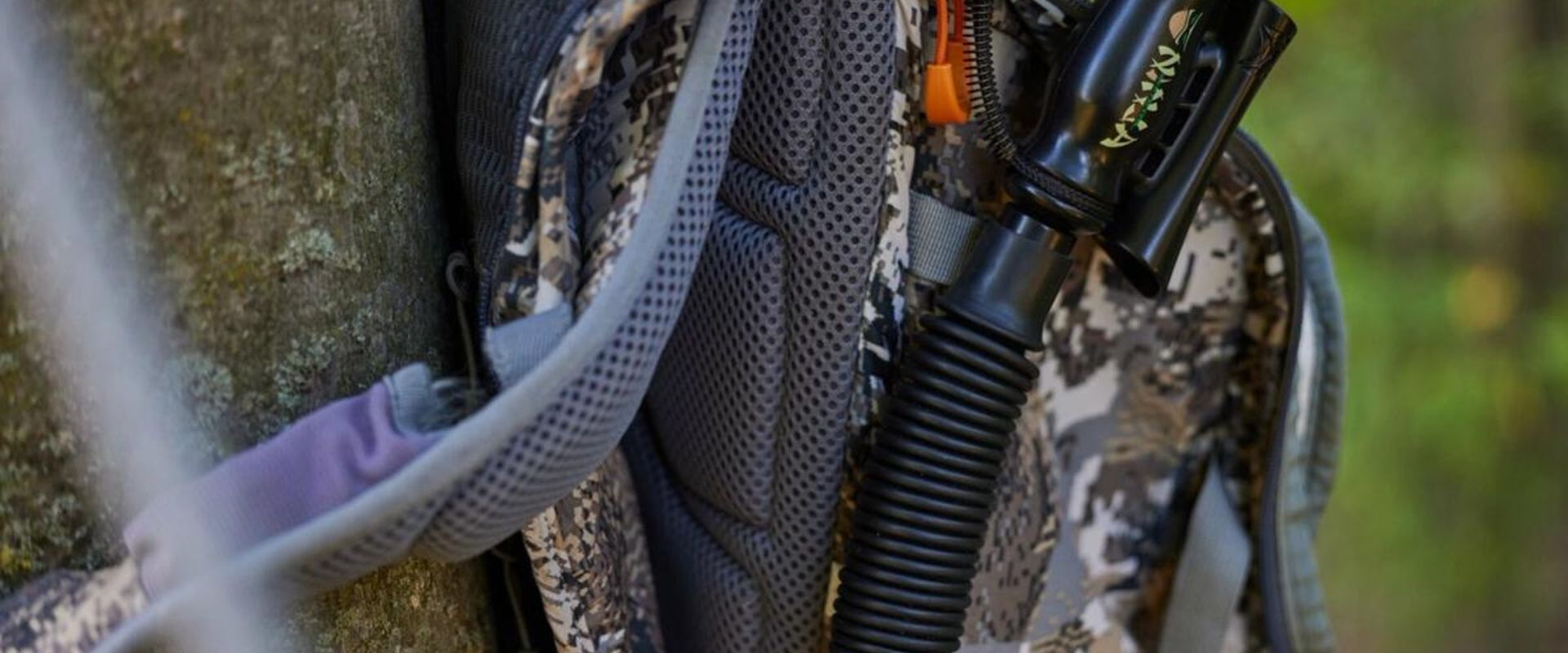 Close-up of a grunt call in a hunter's pack.