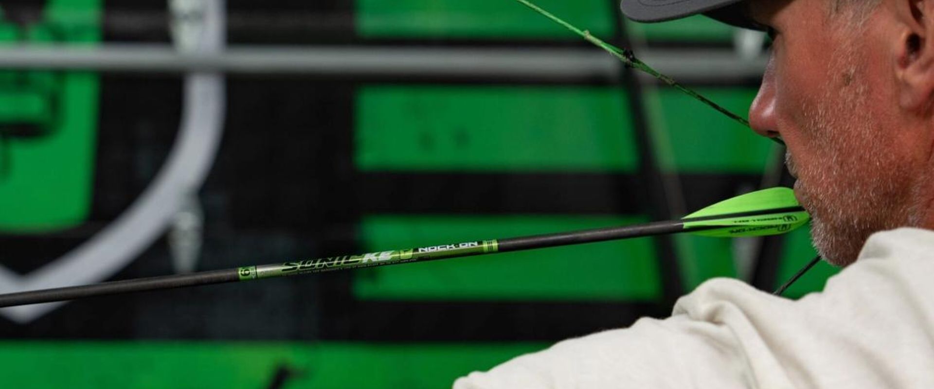John Dudley draws a bow, using compound bows concept.