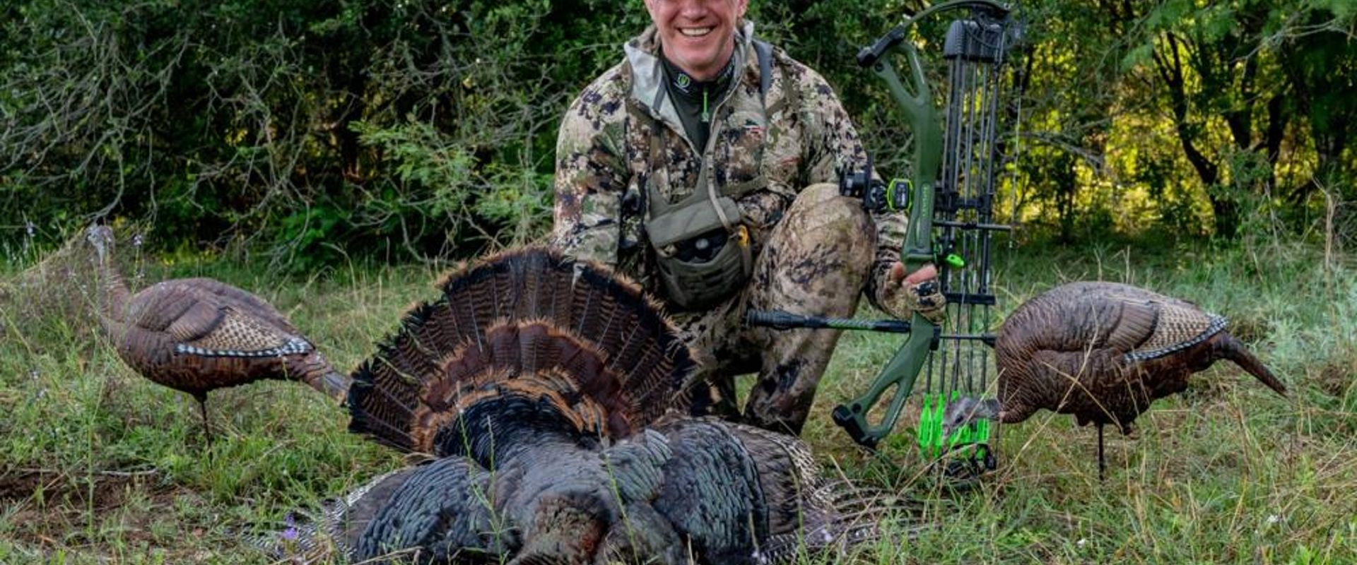 John Dudley with a turkey and decoys after turkey hunting.