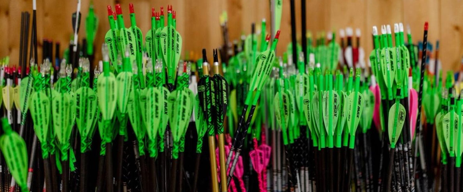 A variety of different arrows, carbon, aluminum, and wooden arrows concept.