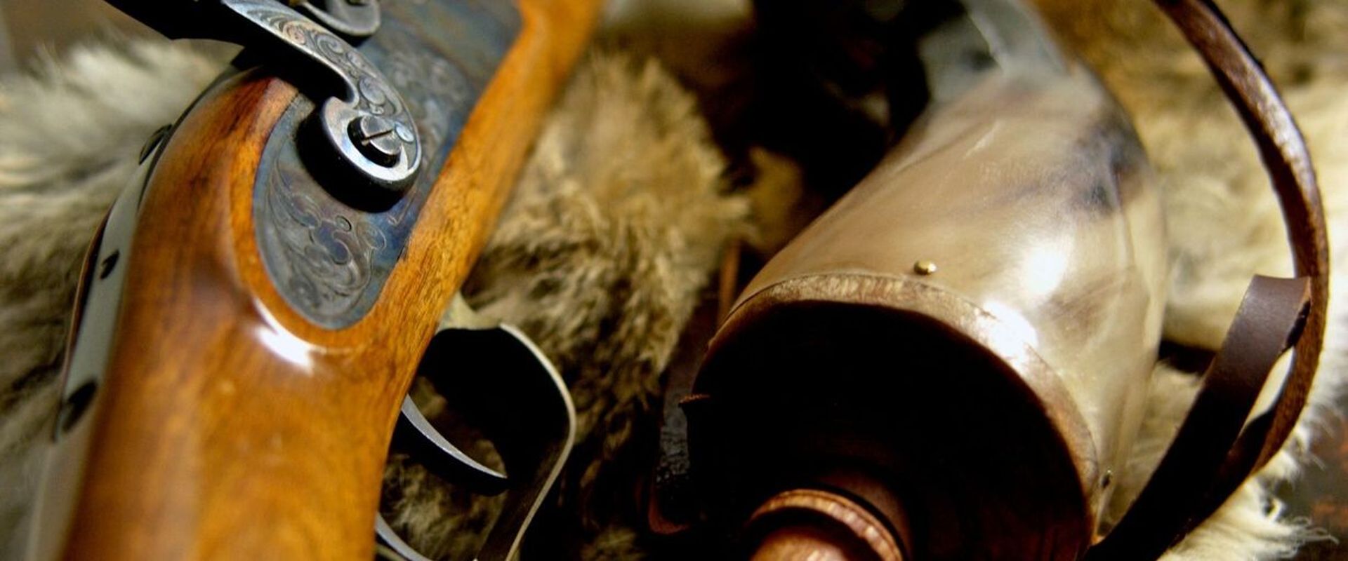 Close up of a muzzleloader and accessories.