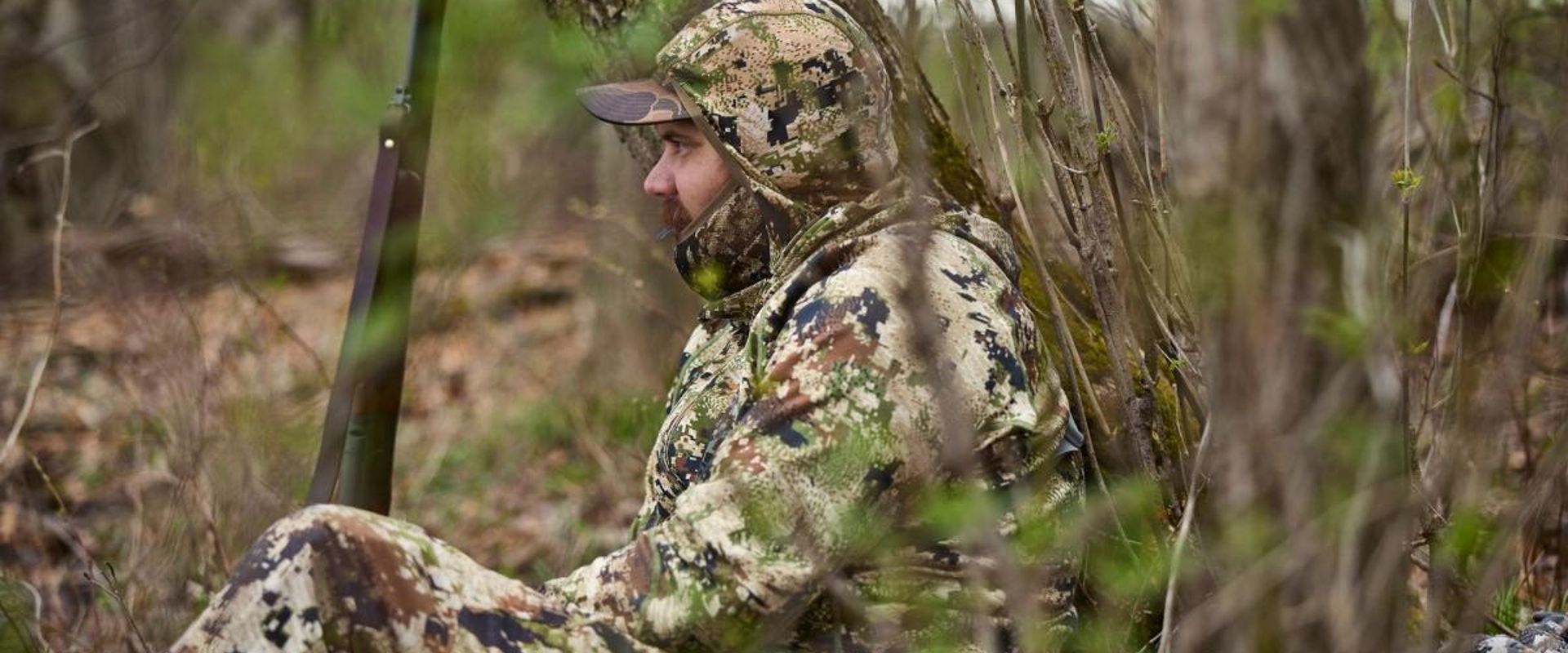 A hunter waits for a spring tom, turkey hunting concept.