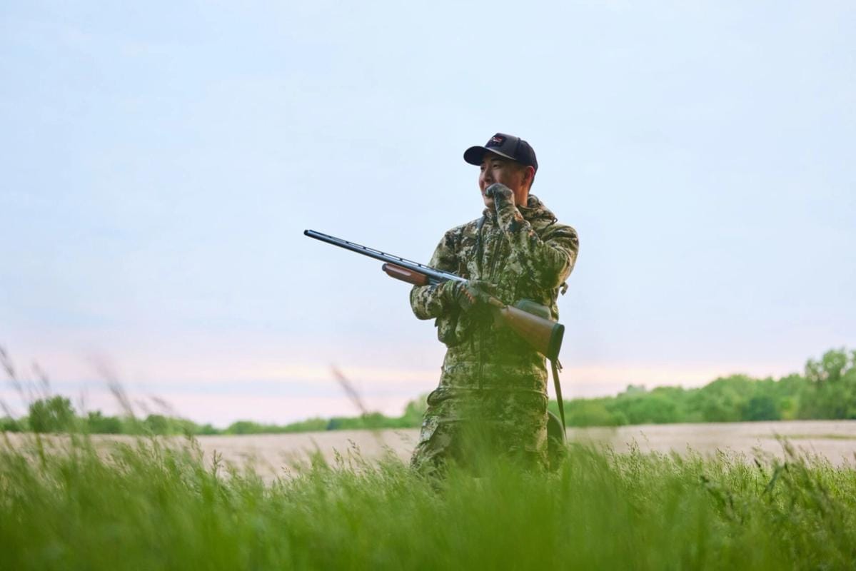 A hunter in turkey clothing, what to wear turkey hunting in the spring concept.