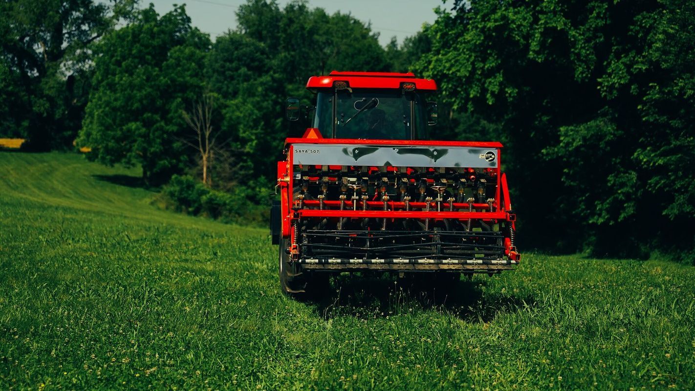 Tractor on a food plot for planting, food plot equipment concept.