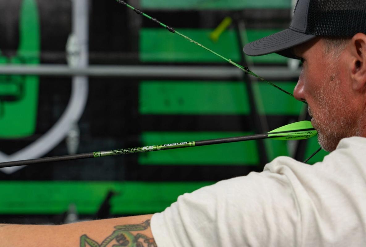 John Dudley draws a bow, using compound bows concept.
