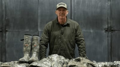 John Dudley in front of his late season hunting clothes recommendations.