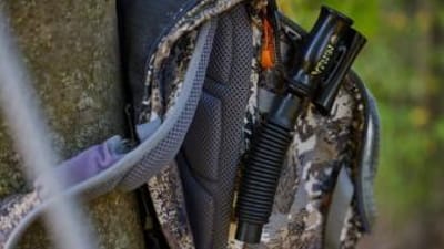 Close-up of a grunt call in a hunter's pack.