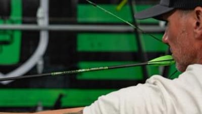 John Dudley draws a bow, using compound bows concept.