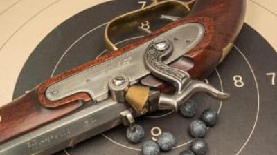 Close-up of a muzzleloader rifle, what is a muzzleloader concept.