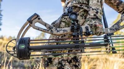 Close-up of a bow carried by a hunter, best bow cases concept.
