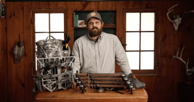 A HuntWise team member shows off mid-season hunting gear.