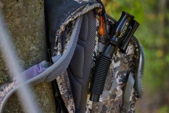 Close-up of a grunt call in a hunter's pack.