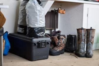 Hunting gear stored after season, post season gear care concept.