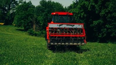 Tractor on a food plot for planting, food plot equipment concept.
