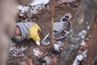 Close-up of a trap set by a hunter, Missouri trapping season concept.