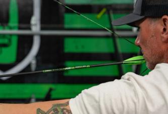 John Dudley draws a bow, using compound bows concept.