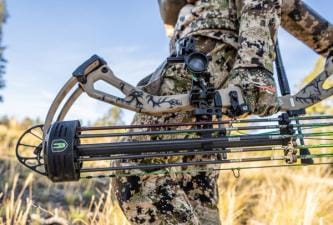 Close-up of a bow carried by a hunter, best bow cases concept.