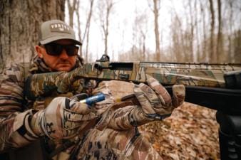 Hunter Taylor Wright loads a shell into a shotgun, how to pattern a shotgun for turkey concept.